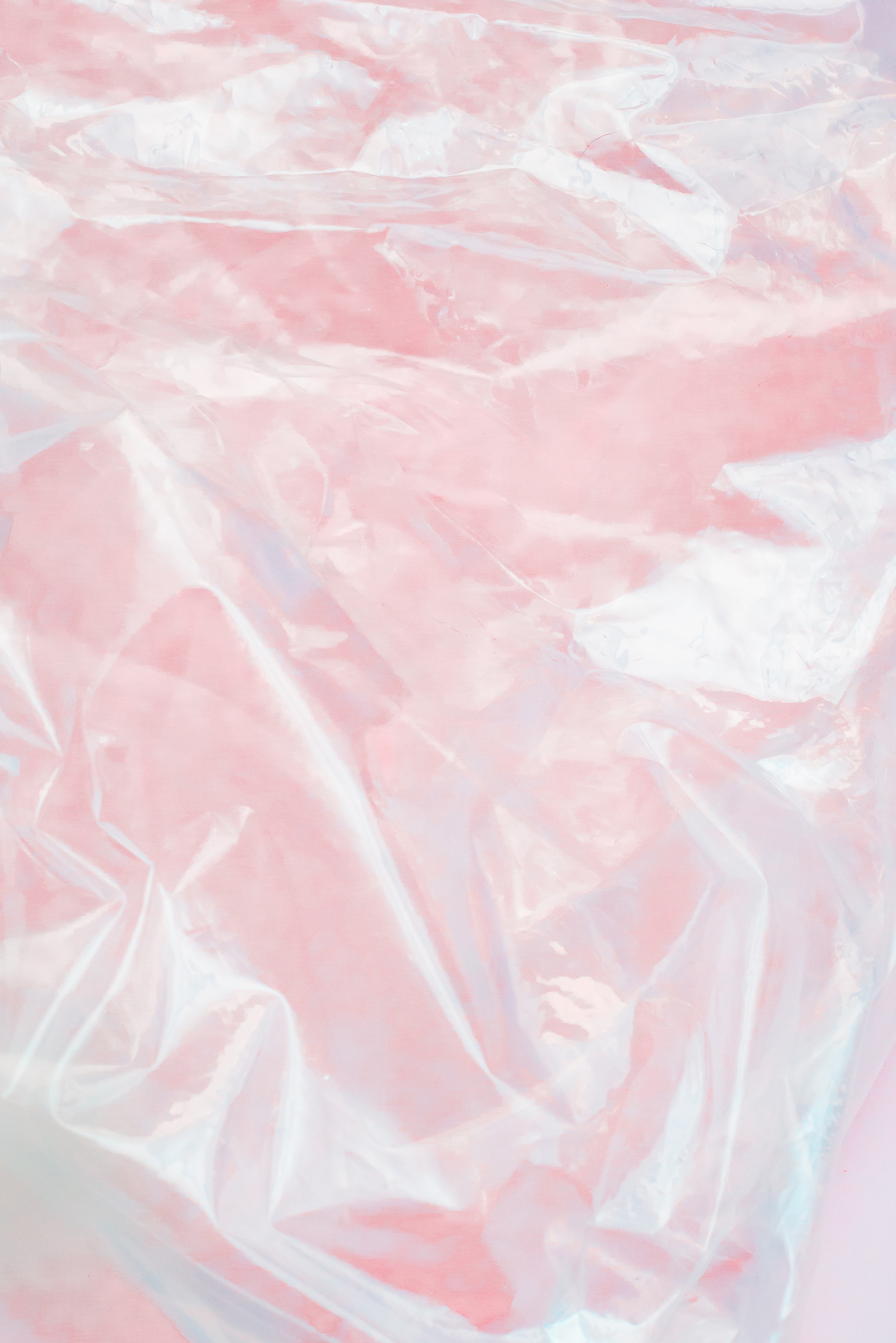 Clear Plastic on Pink Background